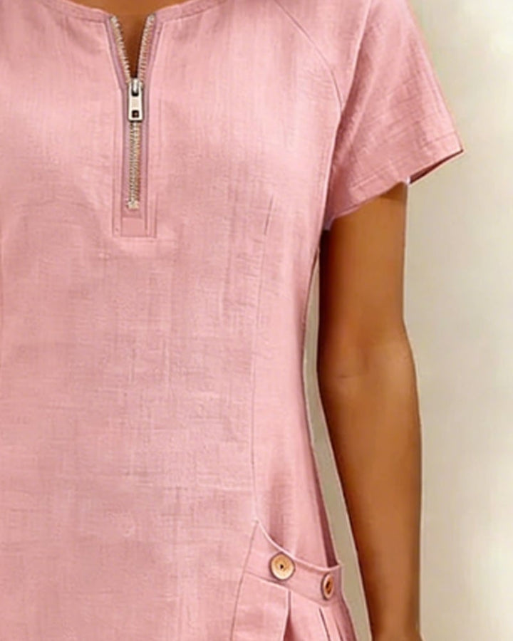 Remi pink dress back view showing clean lines and short sleeve cut