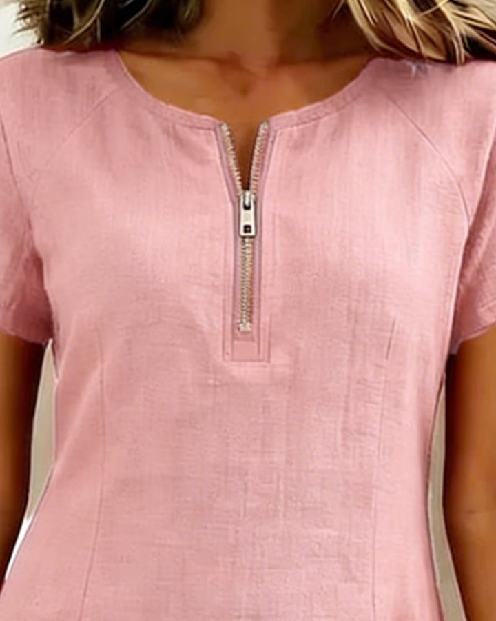 Collection flat lay of Remi shift dresses in multiple colors including red, black, white, and green