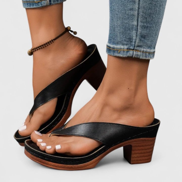 Remy women's black block heel thong sandal with chunky stacked wood-effect heel and platform sole, front view