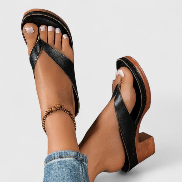 Remy women's thong sandal in brown colorway with platform sole, front three-quarter view