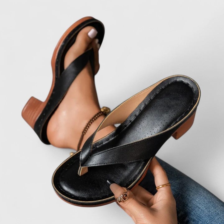 Remy women's block heel thong sandal in gold, side profile showing platform and stacked heel detail