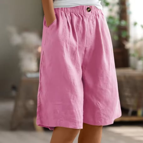 Renee Comfort Shorts in blue laid flat showing mid-thigh length and clean finish
