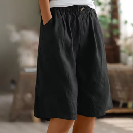 Model wearing Renee Comfort Shorts in army green showing ease of movement