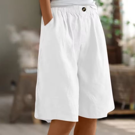 Renee Comfort Shorts in gray paired with a tucked-in top for a polished casual look
