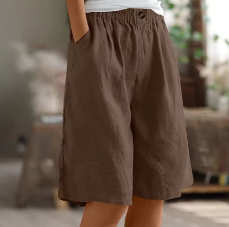 Full-length view of Renee Comfort Shorts in beige on model showing overall fit