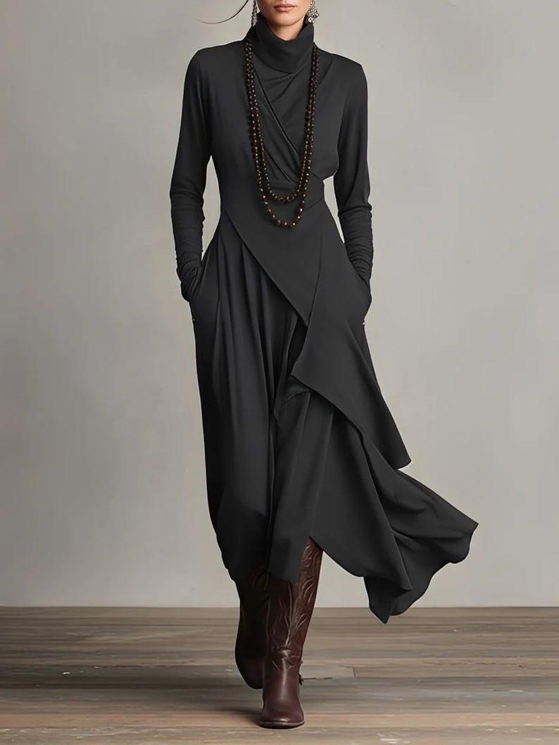 Front view of the Rhea maxi dress in green highlighting the waist-defining silhouette
