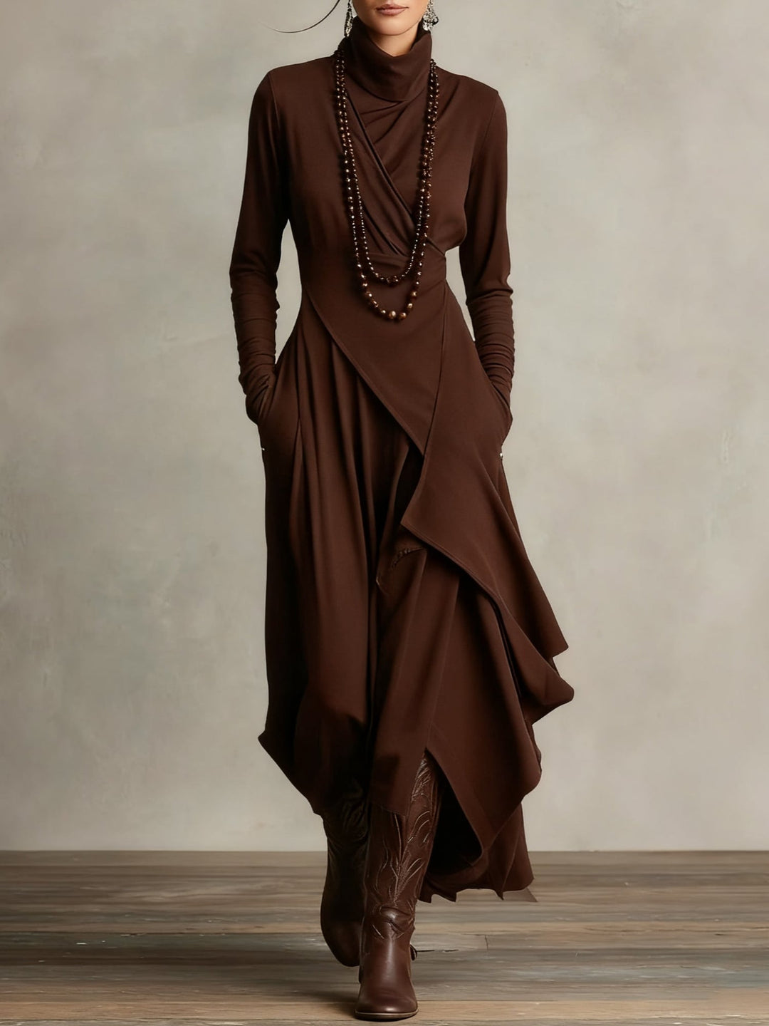 Close-up of the soft draping fabric on the Rhea elegant maxi dress in green