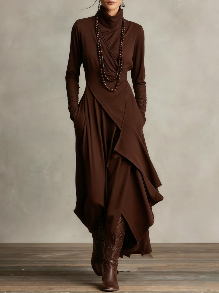 Close-up of the soft draping fabric on the Rhea elegant maxi dress in green