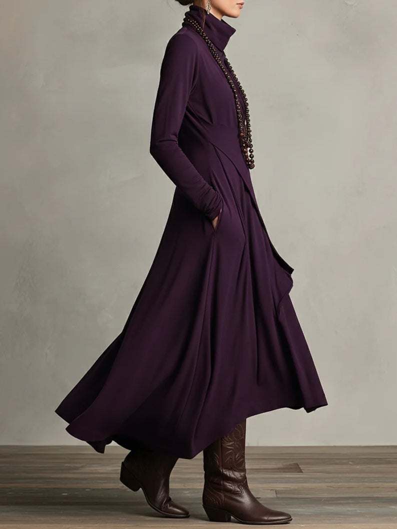 Model wearing the Rhea elegant maxi dress in brown against a neutral background