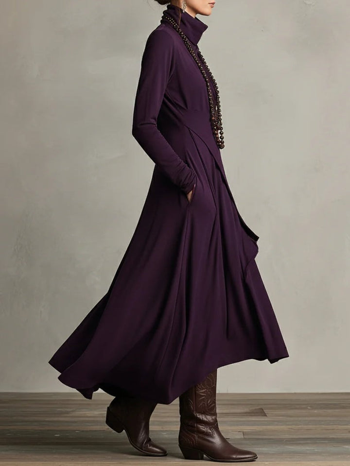 Model wearing the Rhea elegant maxi dress in brown against a neutral background