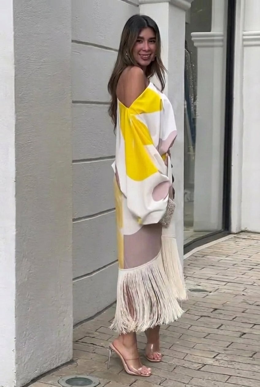 Close-up of delicate fringe detailing on the Rhiannon one shoulder midi set in Beige