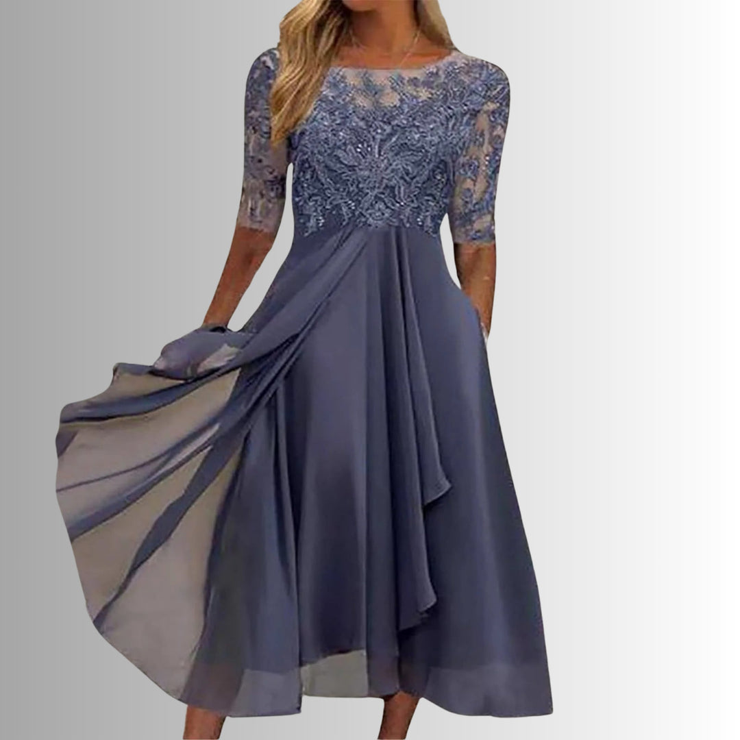 Back view of the Rhonda elegant lace dress in purple showing the full closed-back design