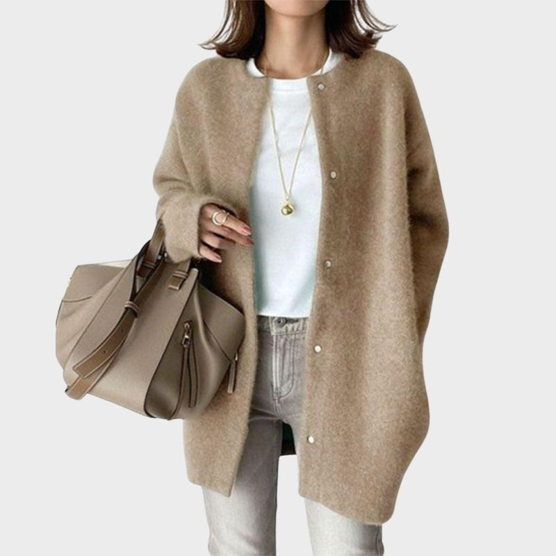 Riley refined layered cardigan in khaki, draped softly over a feminine silhouette