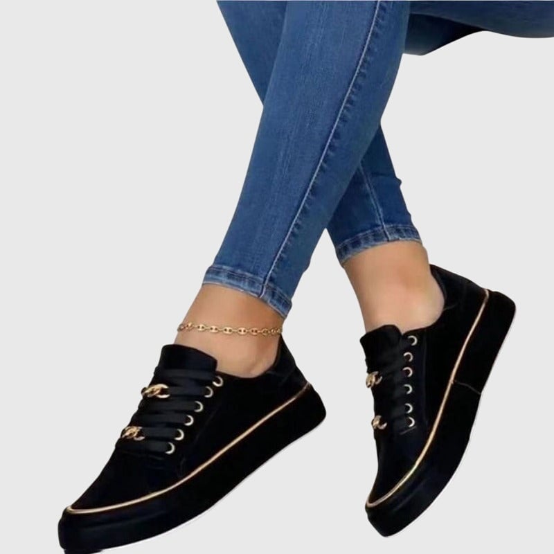 Riley women's casual lace-up sneakers with arch support in black, side profile view