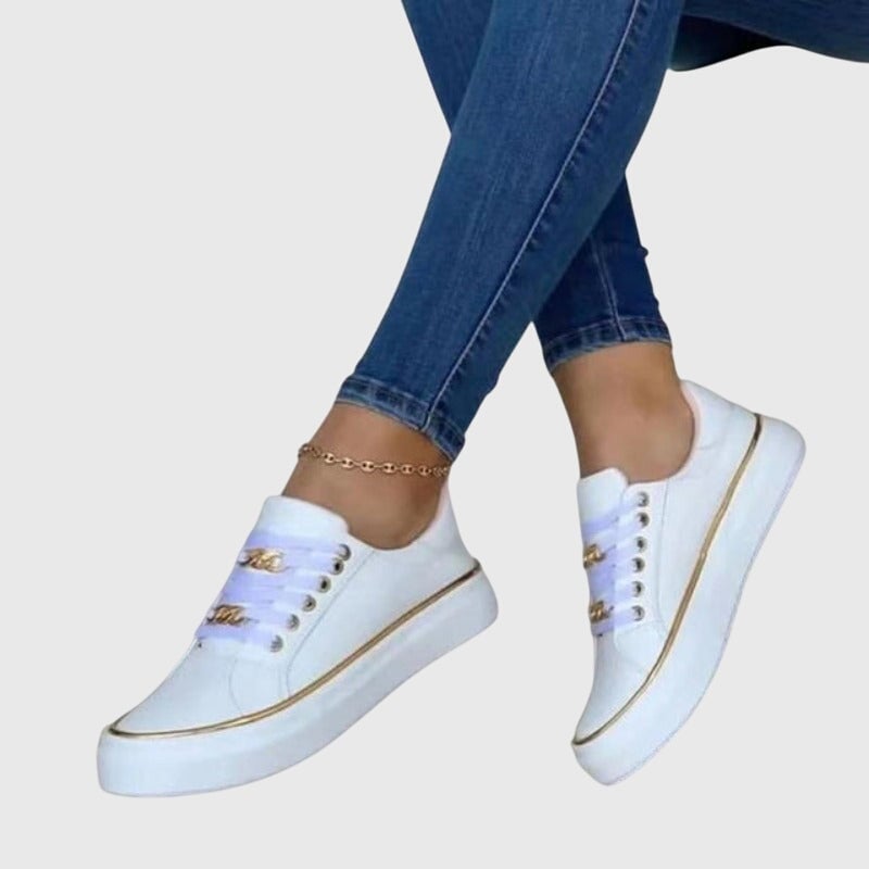 Riley women's lace-up sneakers in white, front three-quarter angle showing cushioned insole