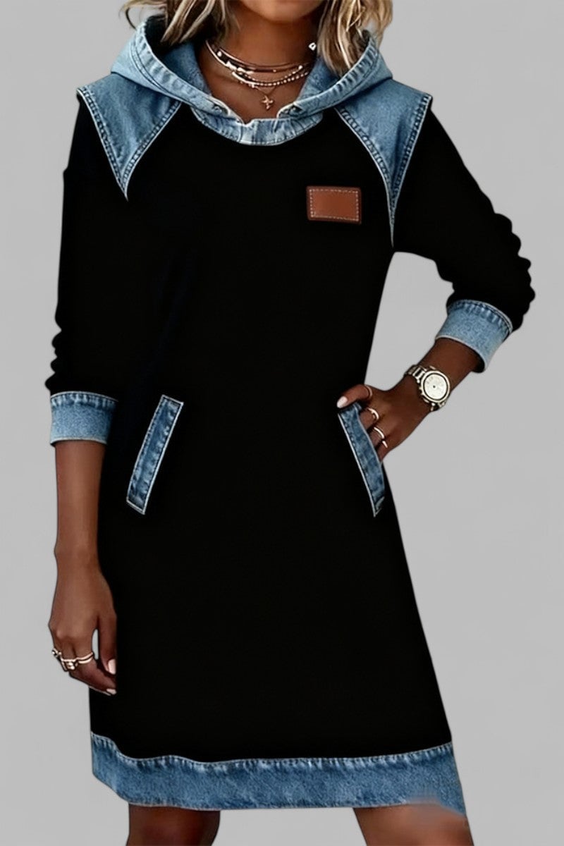 Front view of the Rina denim dress in black showing a fitted waist-defining silhouette