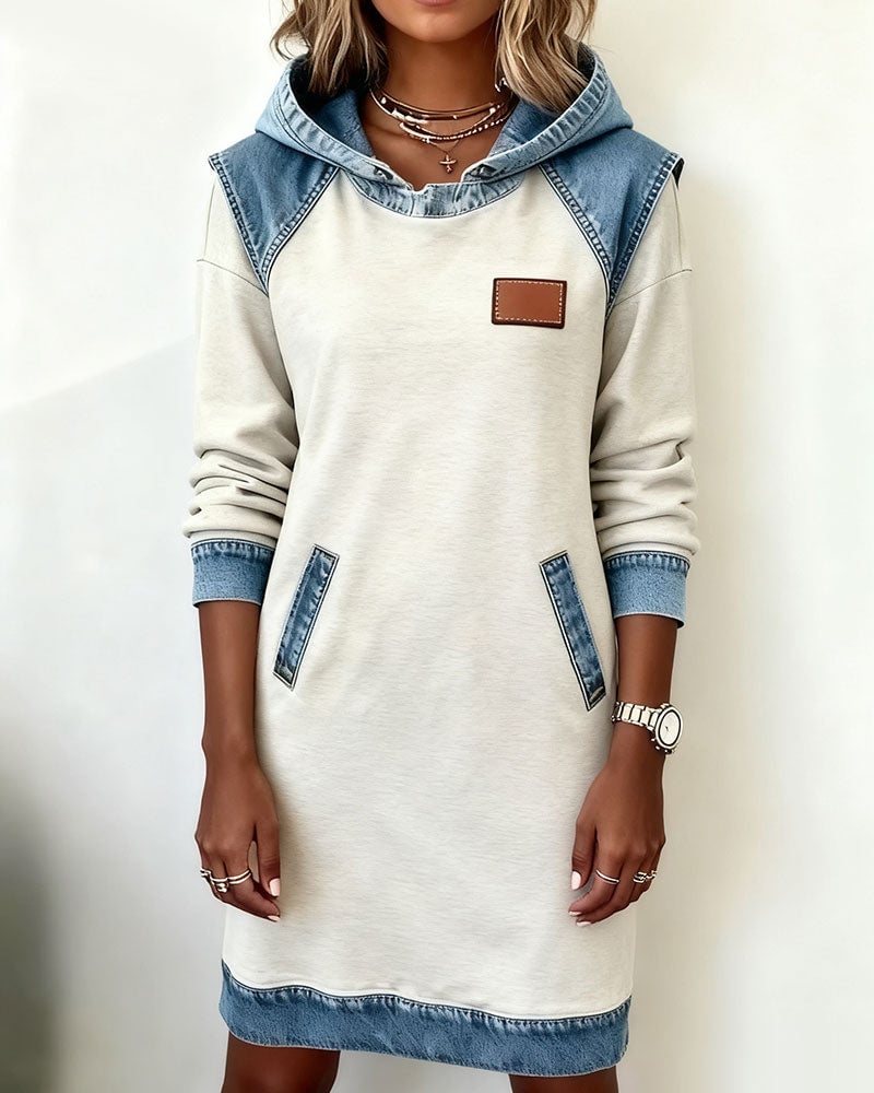 Full-length shot of the Rina denim dress in black on a model showing overall length