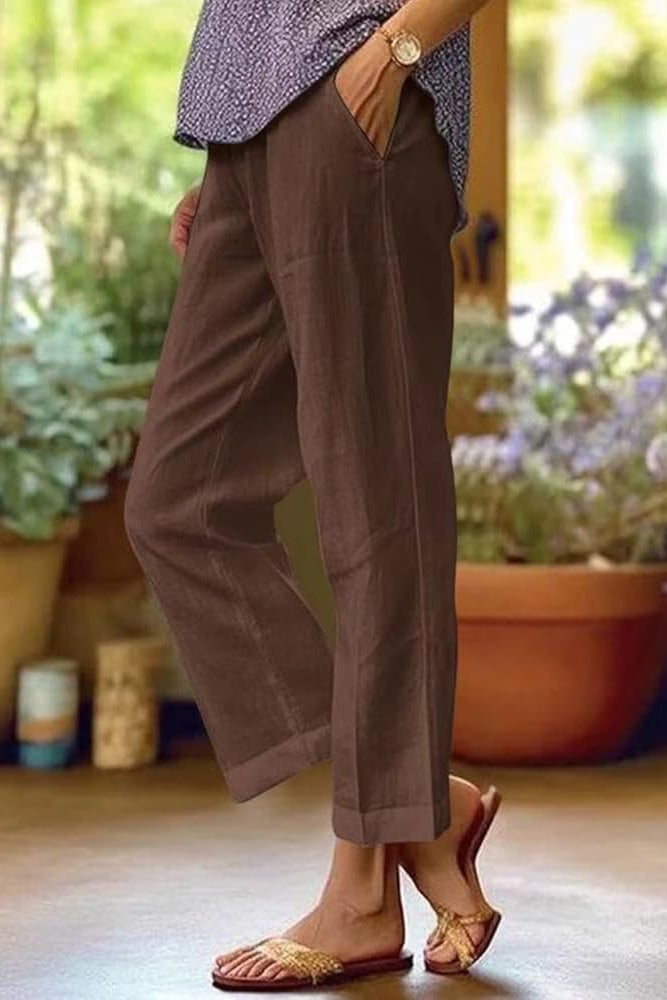 Close-up of lightweight summer trousers showing the flowing fabric drape and clean silhouette