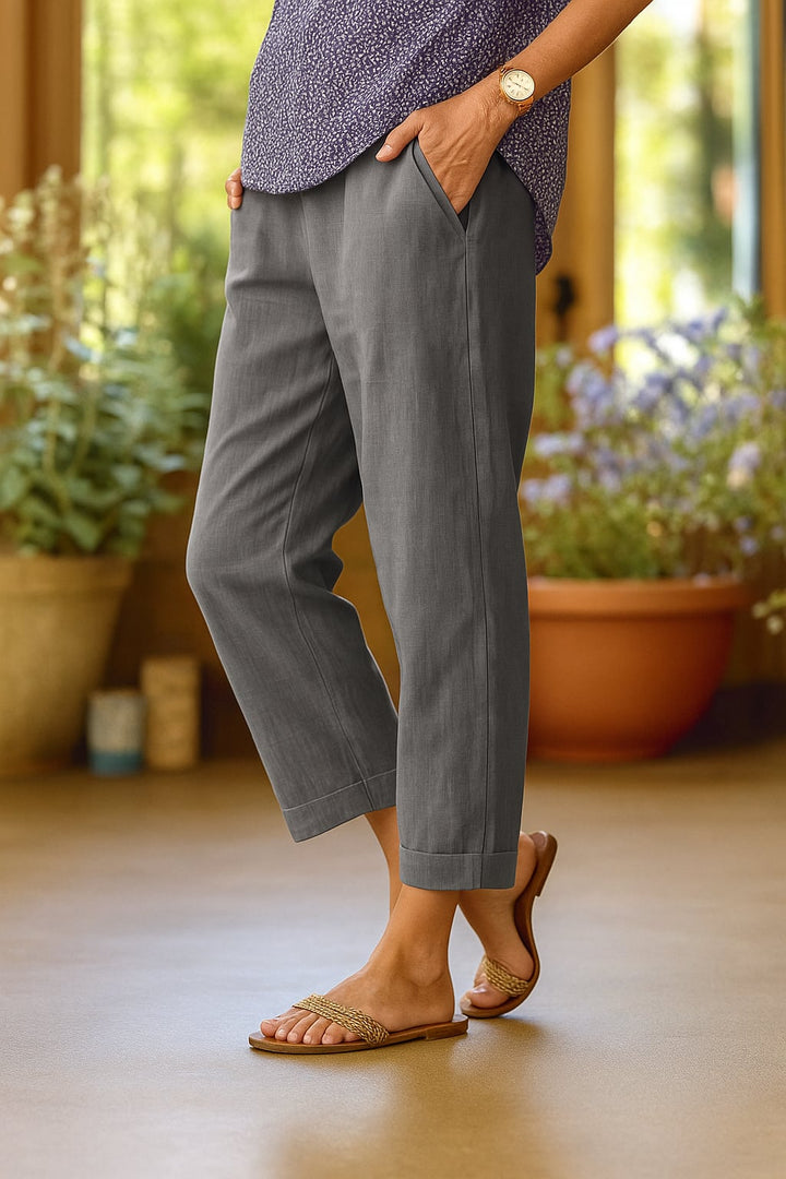 Rita Light Summer Trousers laid flat showing hidden side pocket detail and straight-leg cut