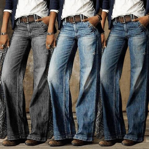 Flat lay of River retro flare jeans showing light gray wash and wide leg silhouette