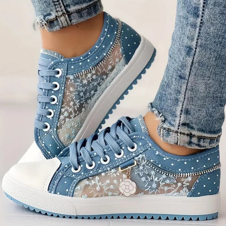 Light blue orthopedic comfort sneakers with wide toe box and cushioned sole on a white background