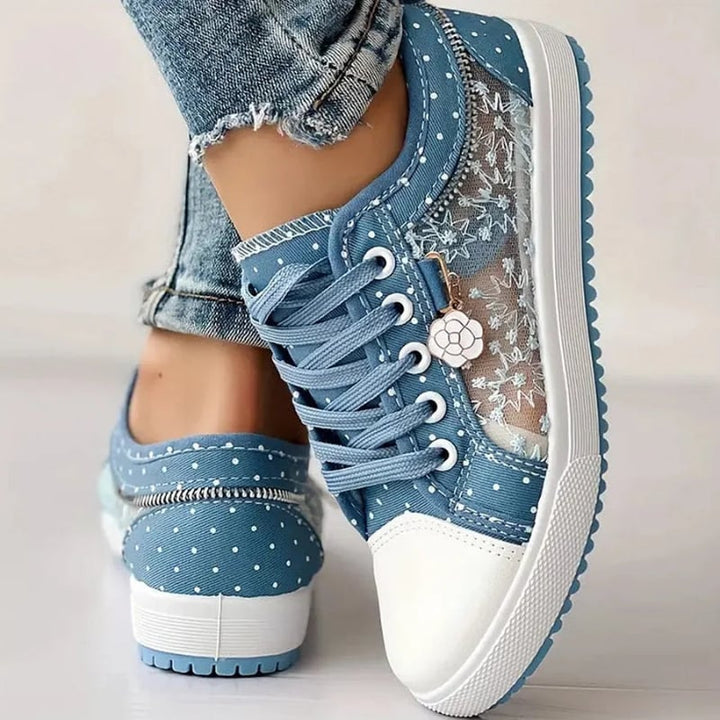 Top-down view of light blue orthopedic sneakers highlighting roomy toe box design