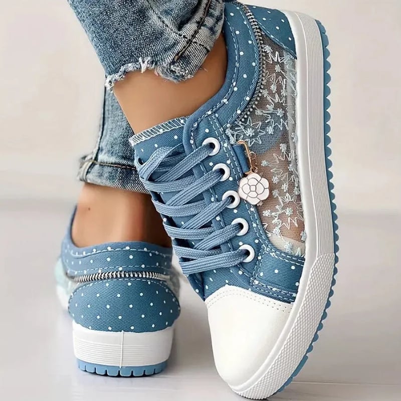 Top-down view of light blue orthopedic sneakers highlighting roomy toe box design