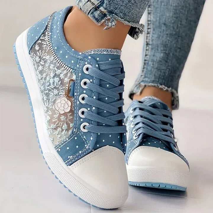 Side view of dark blue women's orthopedic sneakers with ergonomic cushioned sole