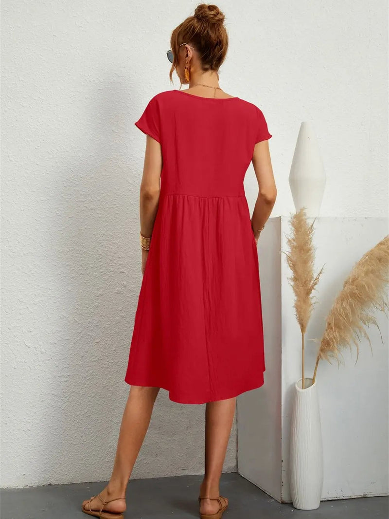 Close-up of casual pocket dress showing side pocket detail and soft, airy fabric drape