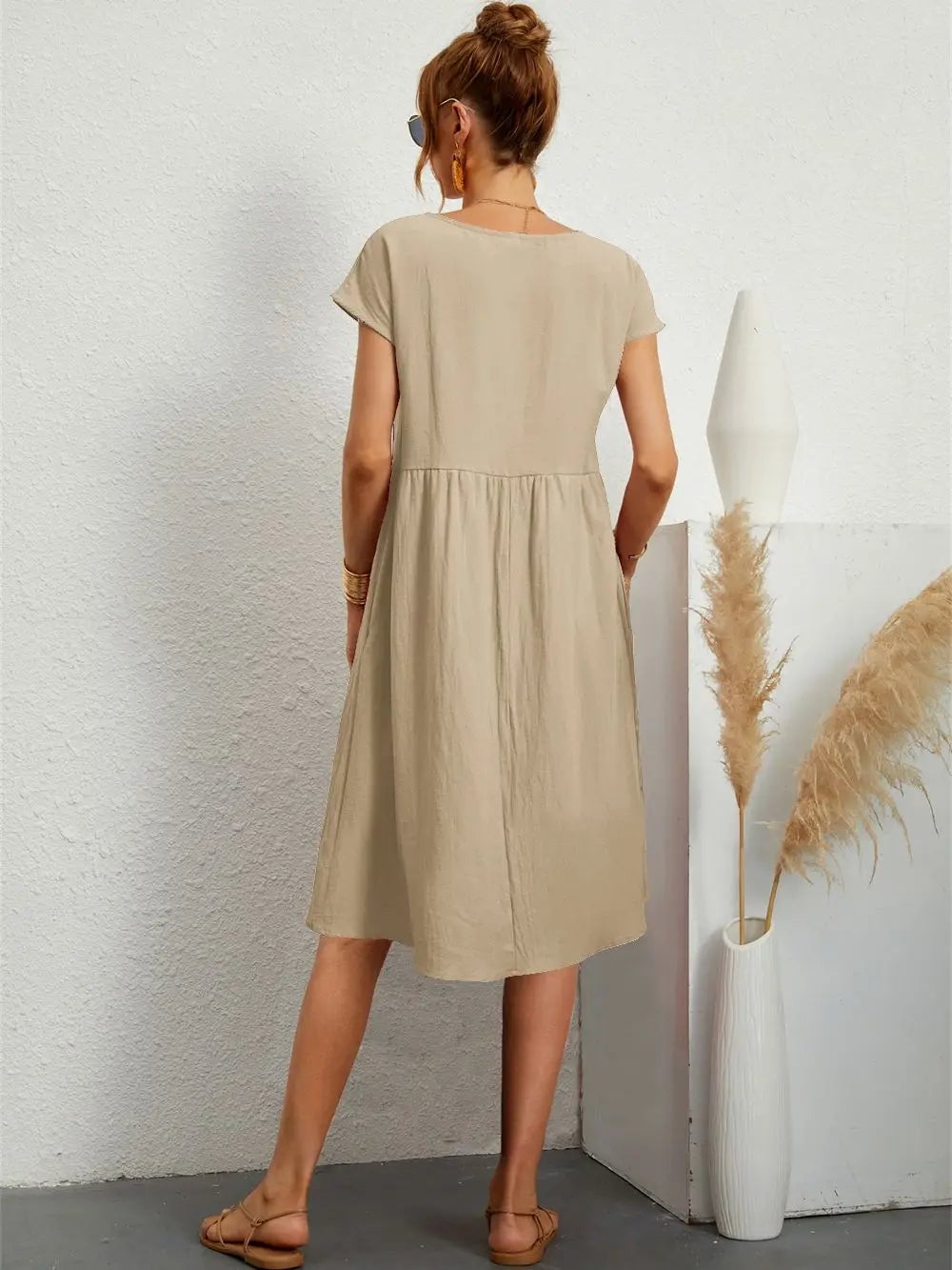 Casual pocket dress displayed to highlight versatile everyday styling options and comfortable fit