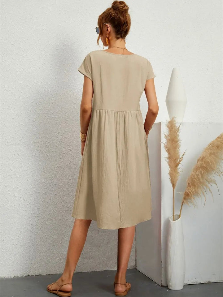 Casual pocket dress displayed to highlight versatile everyday styling options and comfortable fit