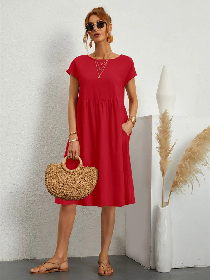 Casual pocket dress in a rich color option, styled for a weekend or brunch occasion