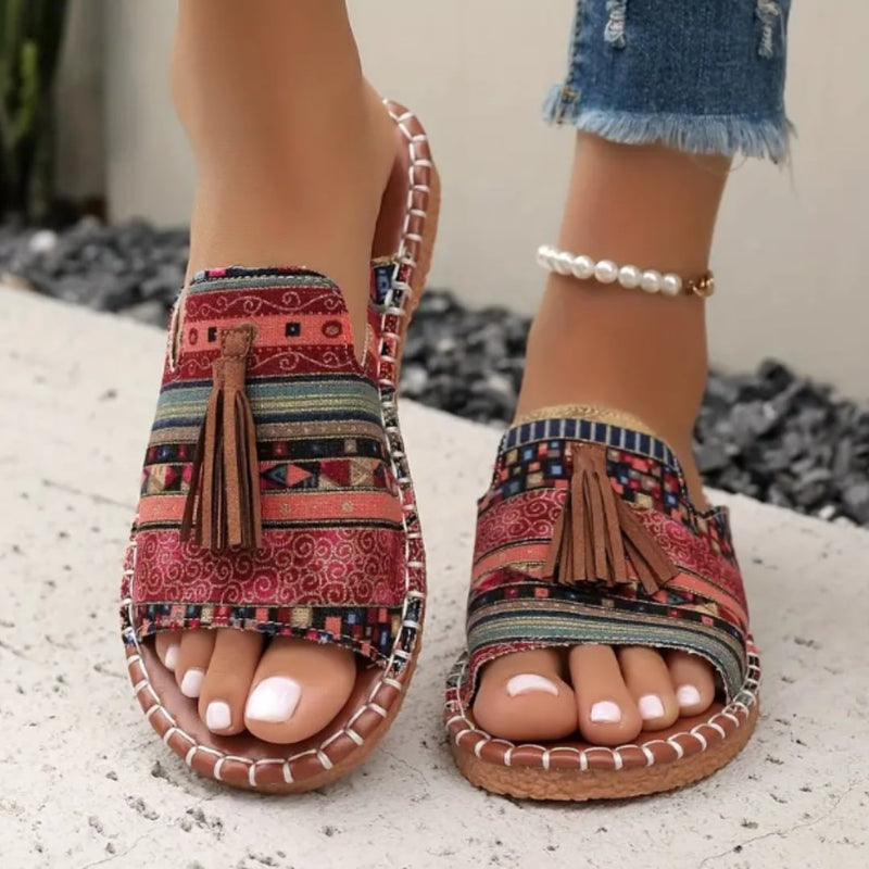 Women's Robin flat sandals in a vibrant color with cushioned footbed, top view