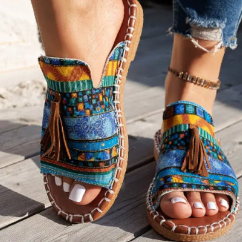 Side view of Robin flat sandals showing soft sole and slip-on silhouette