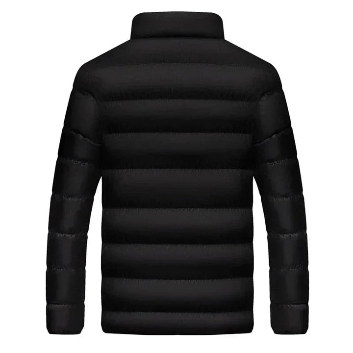 Side profile of the thermal jacket showing its lightweight, streamlined fit and durable zipper detail