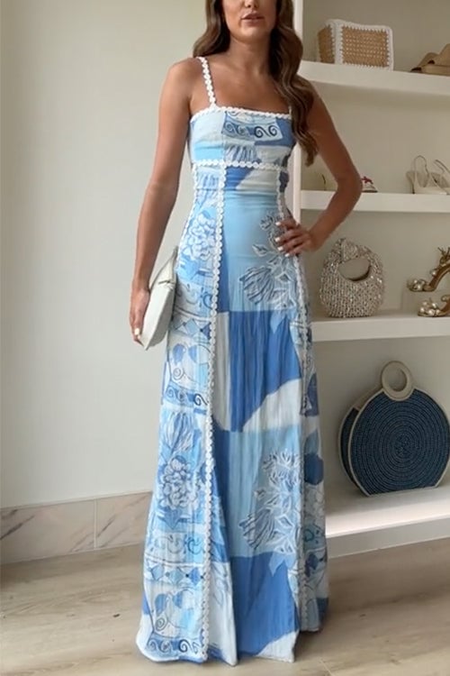 Woman wearing a light blue bow-back maxi dress with flowing fabric and open back detail, front view