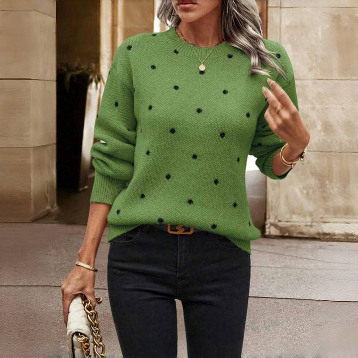 Close-up detail of the Cozy Dot Sweater's subtle dot pattern and breathable knit texture