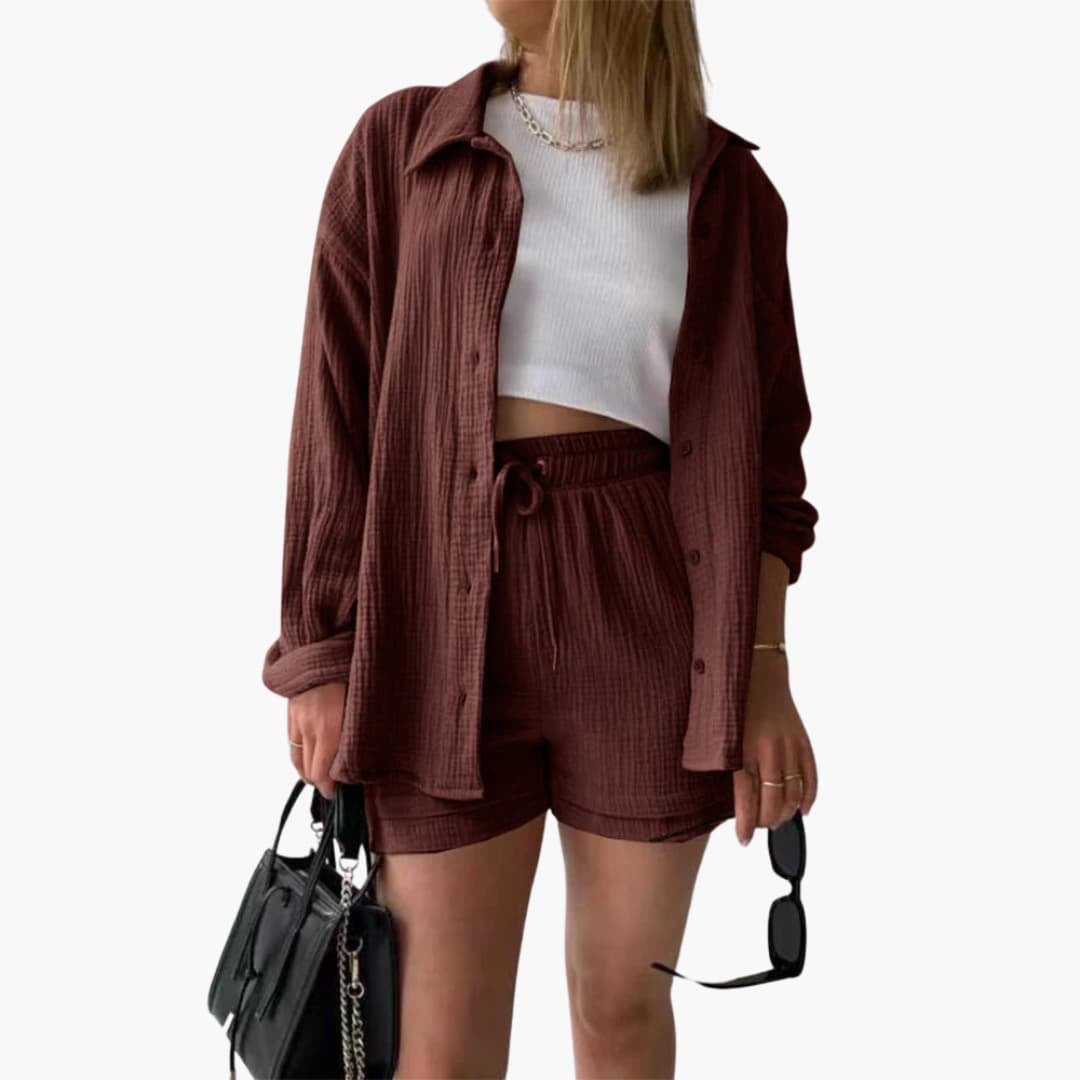 Full outfit shot of the Rosa two-piece set in pink styled with sandals for a breezy summer aesthetic