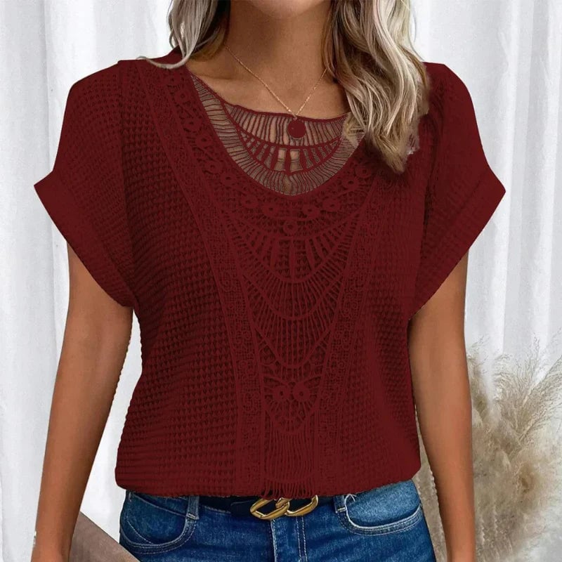 Pink version of the lace trim short-sleeve top styled for a casual daytime look