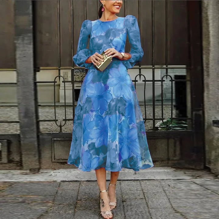 Back view of the Rosalie floral chiffon midi dress in blue showing the back zip closure and watercolor floral print