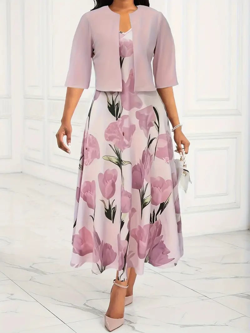 Woman wearing a pink floral maxi dress set with a 3/4 sleeve coordinating jacket, full front view