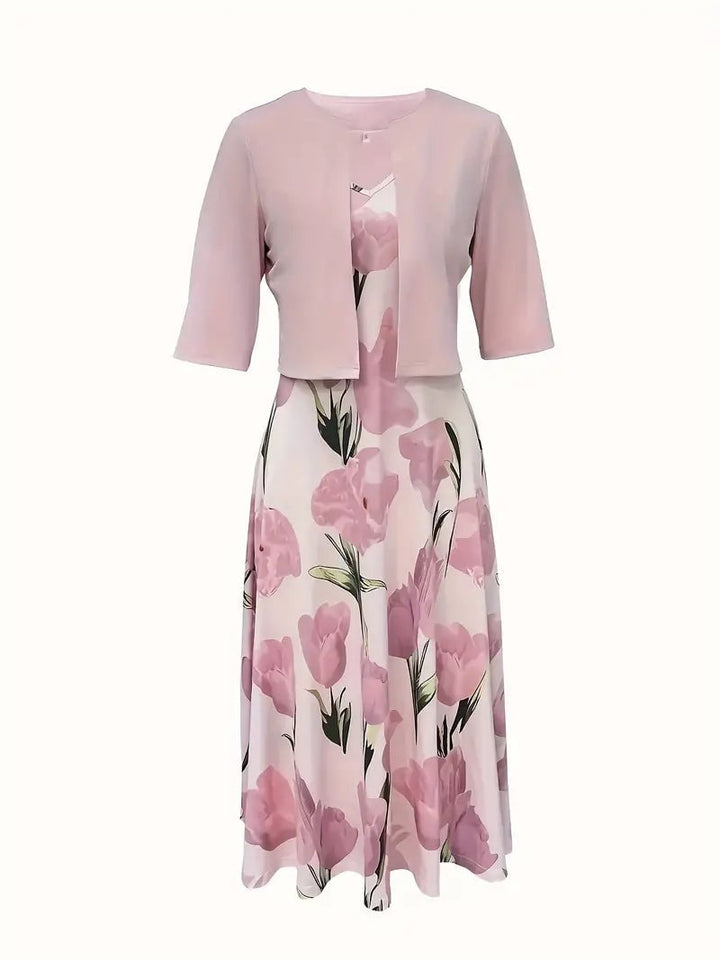 Close-up of the pink floral print on the Rosalie maxi dress set showing romantic bloom detail