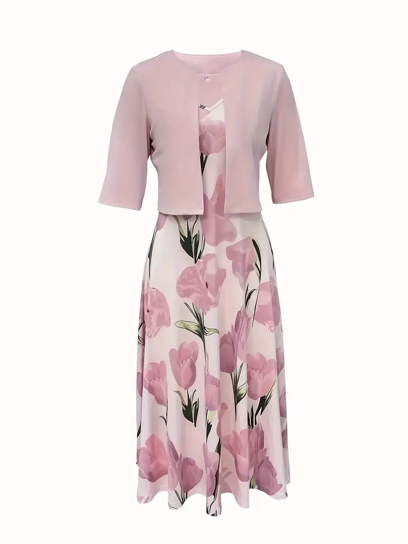 Close-up of the pink floral print on the Rosalie maxi dress set showing romantic bloom detail