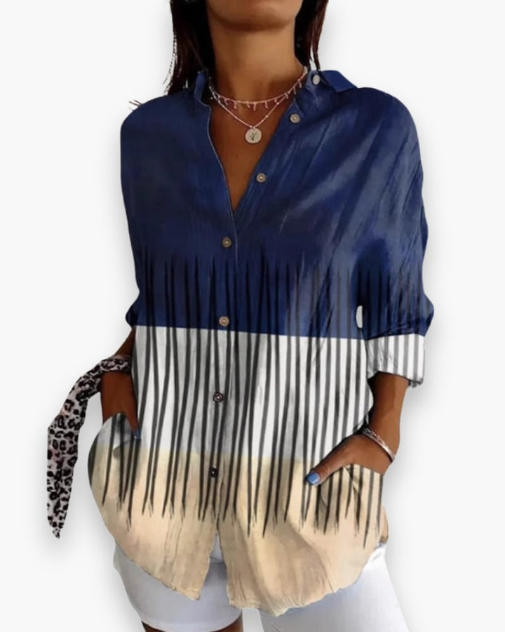 Rosalie floral blouse in sea blue colorway, styled for a casual summer look