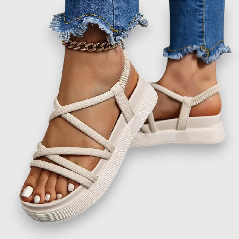 Rosalind beige women's sandals shown from the front on a flat surface