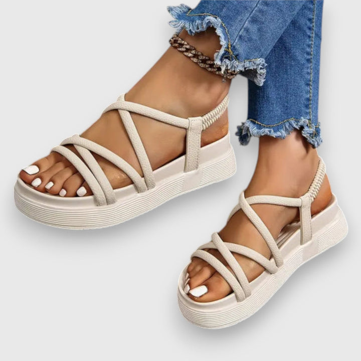 Close-up of the Rosalind sandal sole and strap detailing in beige