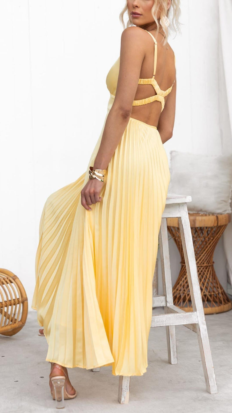 Back view of the Rosalind yellow maxi dress highlighting the elegant drape and silhouette
