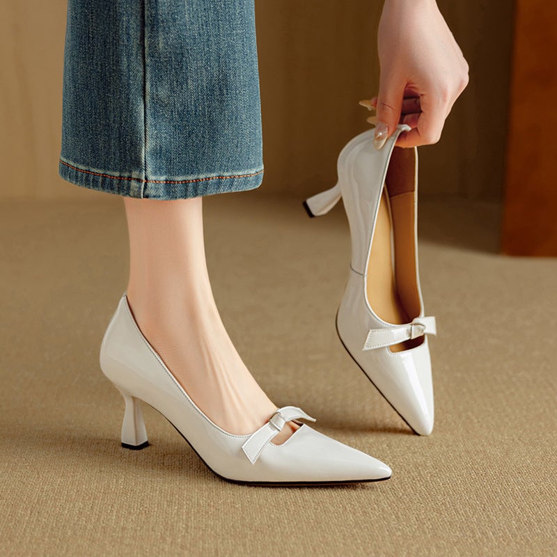 Rosalind white bow detail kitten heel pumps, side profile view