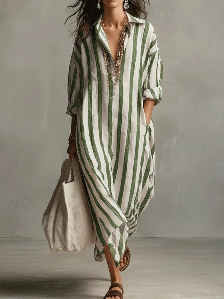 Woman styling a striped maxi shirt dress with sandals for a casual warm-weather look
