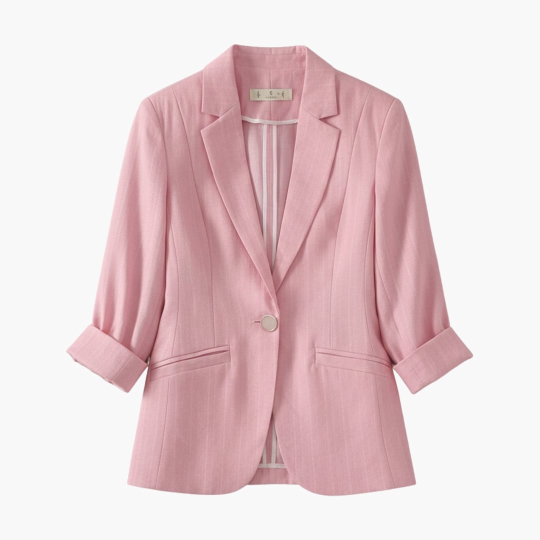 Woman wearing the Rosamund pink 3/4 sleeve blazer with notched lapels and single button closure